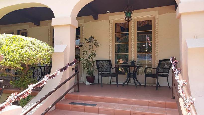 Shaded front porch with seating